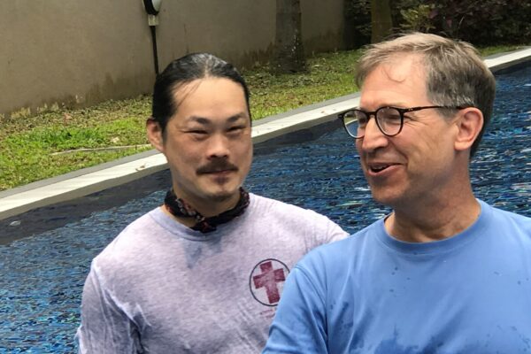 Chang and Jim are pictured right after his baptism.
